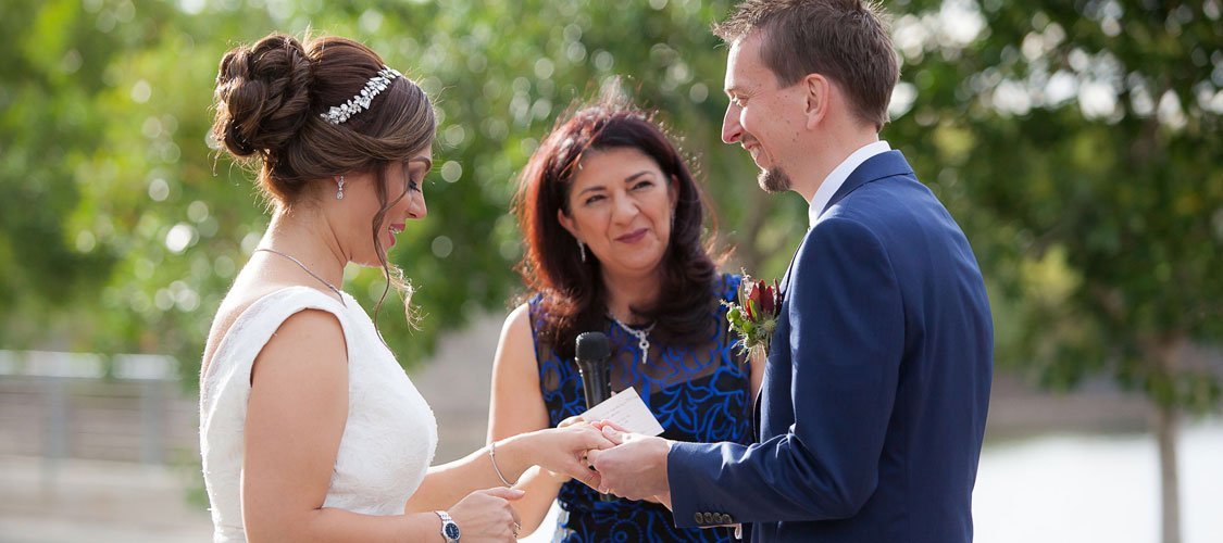 marriage celebrant with wedding couple